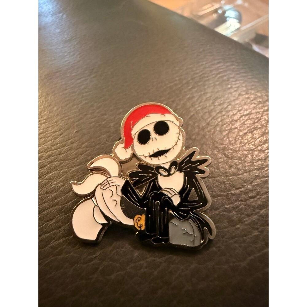 Disney pin featuring Jack Skellington wearing a red Santa hat w/ ghost dog Zero